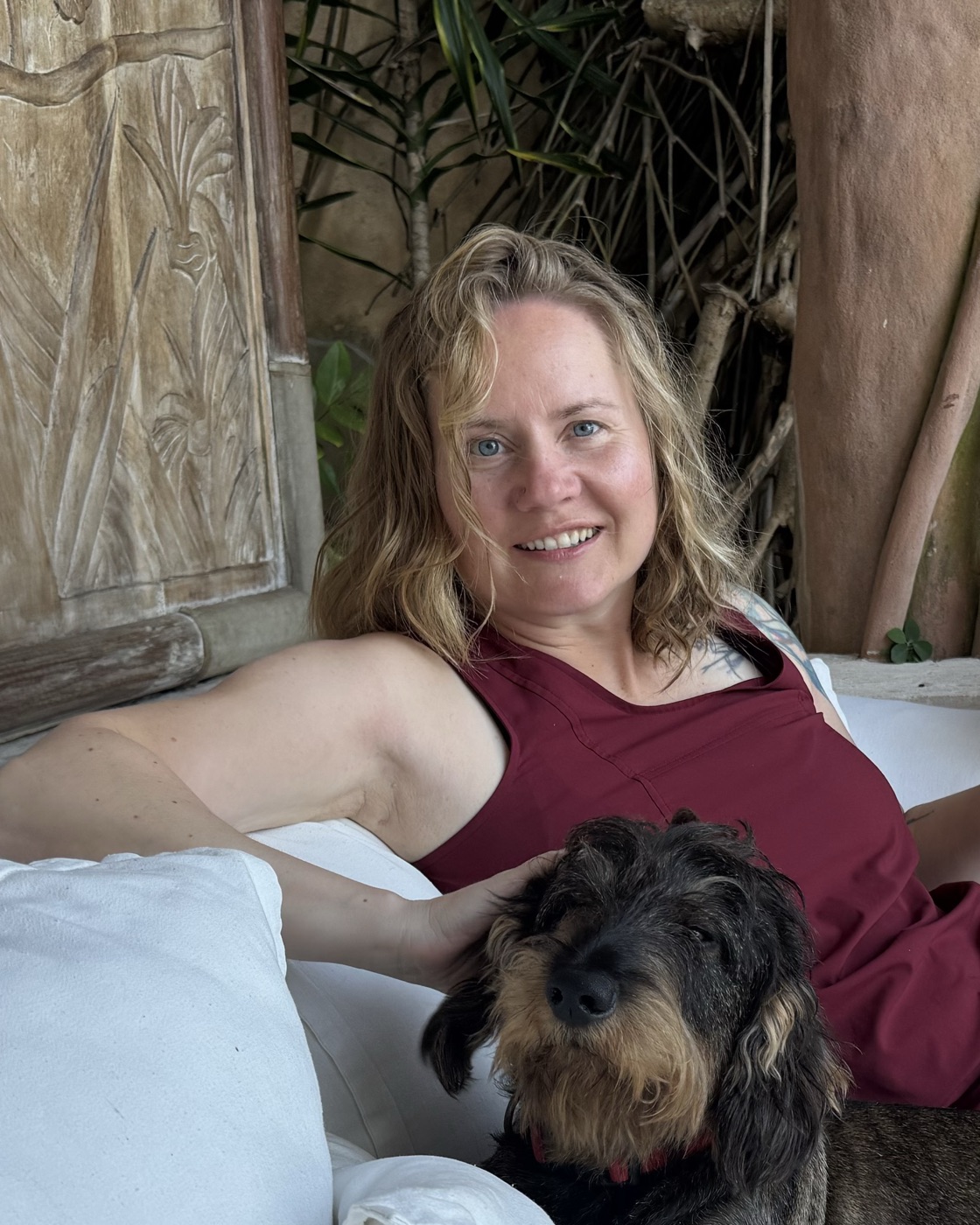 Wiebke Poerschke at home with her wirehaired dachshund.